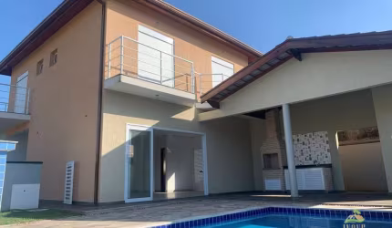 Casa em Condomínio de Luxo à Venda em Morada da Praia, Bertioga/SP: 3 Quartos, 3 Suítes, Piscina e Área Gourmet!