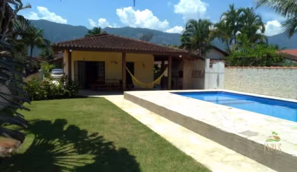 Casa em Condomínio de Luxo à Venda em Morada da Praia - Bertioga/SP: 3 Quartos, 1 Suíte, 2 Salas, 3 Banheiros, 4 Vagas de Garagem - 190m².