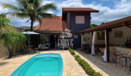 Casa de alto padrão em condomínio na Morada da Praia, Bertioga/SP - 6 quartos, 4 suítes, 3 salas, 5 banheiros, 4 vagas - Imperdível!