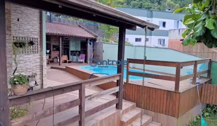 Casa com 4 quartos à venda na Rua Urucum, 4, Potecas, São José por R$ 900.000