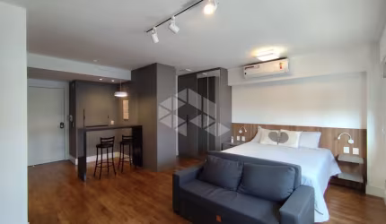 Perfeito loft que une estilo de vida e funcionalidade neste aconchegante, localizado no moderno condomínio Hom Nilo, em Porto Alegre.