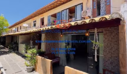 Casa em village com 3 quartos + depend&#234;ncia em condomínio com piscina perto da praia de Stella Maris