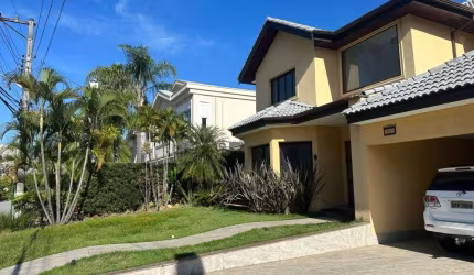 Casa em condomínio fechado com 4 quartos para alugar na Rua Jatobá, Tamboré, Santana de Parnaíba, 460 m2 por R$ 23.000