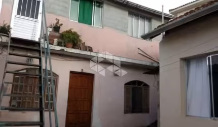 Terreno com 3 casas na Parada Inglesa