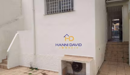 Excelente Casa Comercial com duas vagas na garagem