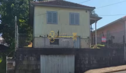 Terreno com casa
