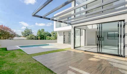 Casa de condomínio com 499 m², 4 quartos sendo 4 suítes à venda no bairro Orleans.