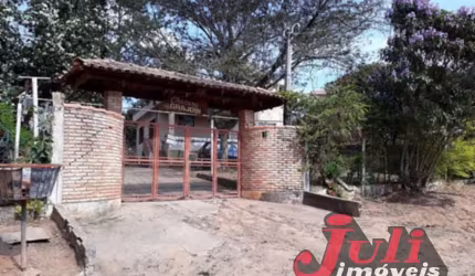 TERRENO COM MORADIA E PISCINA