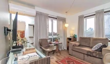 Apartamento no Bairro Auxiliadora de 1 dormitório e 2 vagas