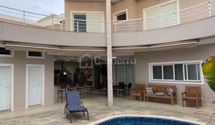 Casa com 5 dormitórios à venda, 361 m² por R$ 2.700.000,00 - Condomínio Terras do Imperador - Ameri