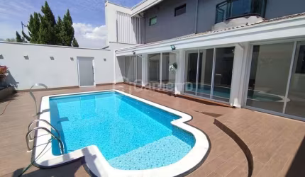 Casa com 4 dormitórios, sendo 3 suítes, à venda, 372 m² por R$ 2.690.000 - Loteamento Residencial J