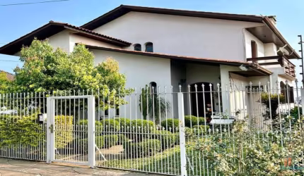 Casa com 4 quartos à venda na João Pola, 515, Rio Branco, Caxias do Sul por R$ 1.050.000