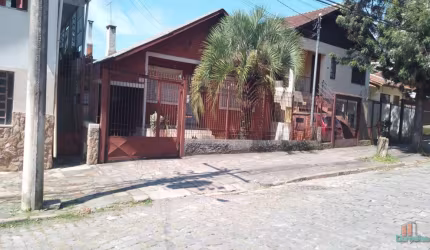 Casa com 3 quartos à venda na Rua Carlos Mauri, 126, São Leopoldo, Caxias do Sul por R$ 499.000