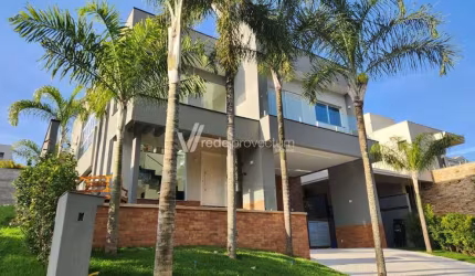 Casa em condomínio fechado com 4 quartos para alugar na Rua das Abélias, 1, Alphaville Dom Pedro, Campinas, 354 m2 por R$ 23.000