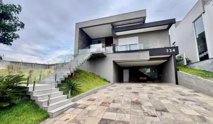 Casa em Condomínio com 4 dorm. no bairro Alphaville Gravataí em Gravataí