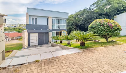 Casa em condomínio fechado com 4 quartos para alugar na Rua Lino Estácio dos Santos, 1180, Oriço, Gravataí por R$ 7.700