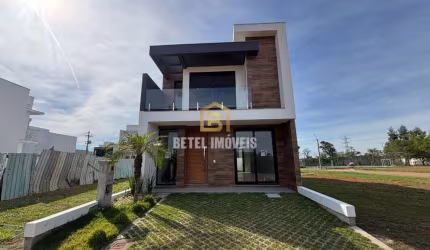 Casa em condomínio fechado com 3 quartos à venda na Avenida Centenário, 1011, Passo das Pedras, Gravataí por R$ 890.000