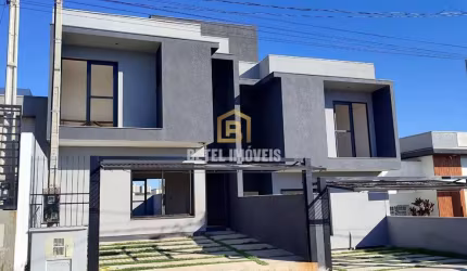 Casa com 3 quartos à venda na Rubem Fonseca Vargas, 120, Dom Feliciano, Gravataí por R$ 549.900