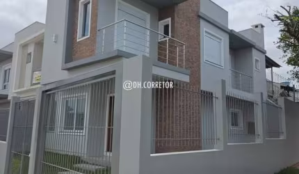Casa com 3 quartos à venda na Rua Érico Veríssimo, 53, Nossa Senhora das Graças, Canoas, 205 m2 por R$ 780.000