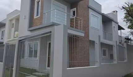 Casa com 3 quartos à venda na Rua Érico Veríssimo, 53, Nossa Senhora das Graças, Canoas, 205 m2 por R$ 780.000