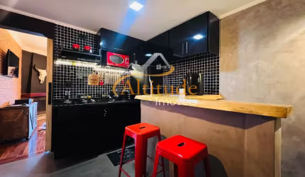 Apartamento rústico e sofisticado com lareira e design marcante - Quatre Saisons Residence
