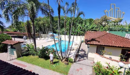 Village com 2 dormitórios à venda por R$ 400.000 - Centro - Bertioga/SP