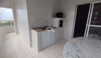 Apartamentoa venda na praia grande na vila mirim com 2 quartos, 1 suite e 1 vaga