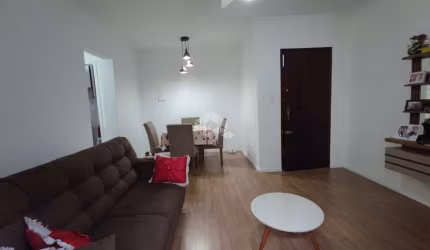 Apartamento a venda na praia grande no bairro guilhermina com 1 quarto e 1 vaga