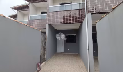 Sobrado novo individual a venda na praia grande, no jd. real, com 2 quartos, 1 Suíte  e 1 vaga