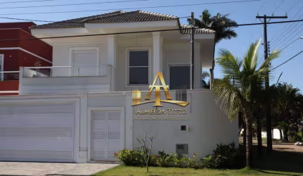 Casa com 4 dormitórios à venda, 300 m² por R$ 1.826.000,00 - Balneário Praia do Pernambuco - Guarujá/SP