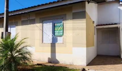 Casa em condomínio fechado com 3 quartos para alugar na Acesso Terra Nova, 601, Terra Nova, Alvorada, 80 m2 por R$ 1.590