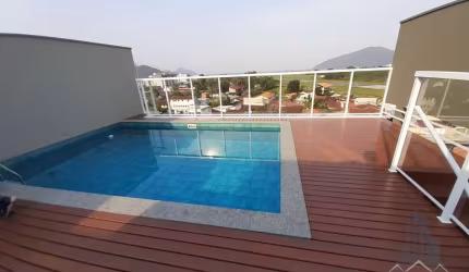 Oportunidade Única em Ubatuba: Área com Vista para o Mar, 2 Suítes e Financiamento Facilitado!