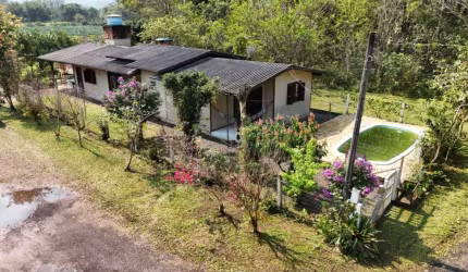 Casa com 3 quartos à venda na vereador Flavio Dalpiaz, Centro, Maquiné por R$ 420.000