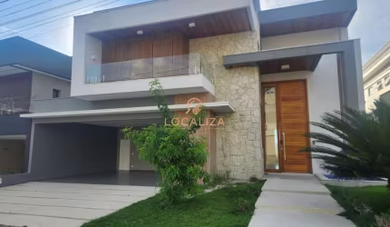 Casa de luxo em condomínio: 4 quartos, 4 suítes, 3 salas, 6 banheiros, 4 vagas, 450m² em SJCampos-SP.