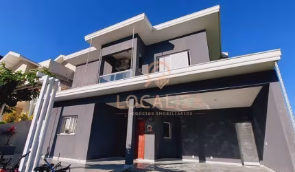 Casa em condomínio à venda em Caçapava-SP, 3 quartos, 3 suítes, 3 salas, 5 banheiros, 2 vagas de garagem - Imperdível!