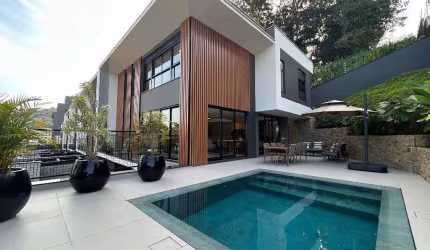 Casa 03 suítes no América