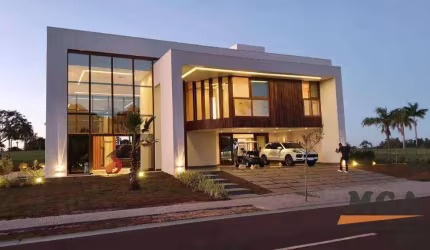 Sobrado com 4 dormitórios à venda, 581 m² por R$ 4.300.000,00 - Condomínio Village Iguassu Golf Residence - Foz do Iguaçu/PR