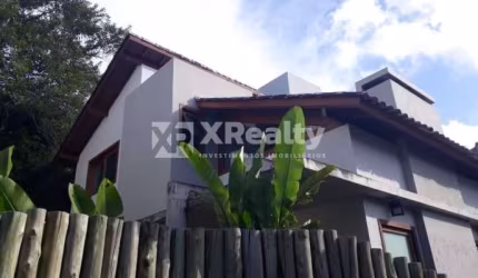 Casa em condomínio fechado com 2 quartos à venda na Rua Laurindo Januário da Silveira, 4577, Lagoa da Conceição, Florianópolis por R$ 1.500.000