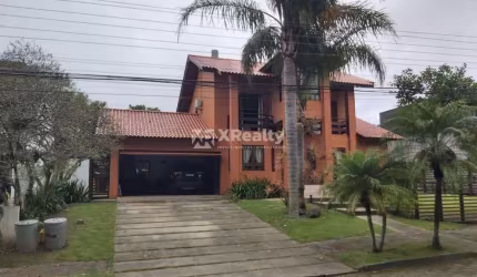 Casa em condomínio fechado com 4 quartos à venda na Rod Dr  Antônio Luiz Moura Gonzaga, 647, Rio Tavares, Florianópolis por R$ 4.500.000