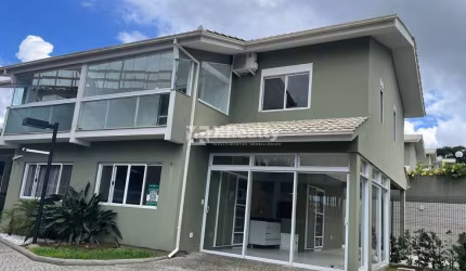 Casa em condomínio fechado com 3 quartos à venda na Rodovia Jornalista Manoel de Menezes, 2201, Barra da Lagoa, Florianópolis por R$ 1.600.000