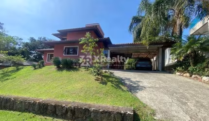 Casa em condomínio fechado com 4 quartos à venda na Rodovia, 383, Rio Tavares, Florianópolis por R$ 2.950.000