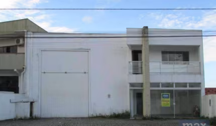 Venda: Galpão com mezanino e recepção. Bairro: Centro (Navegantes)
