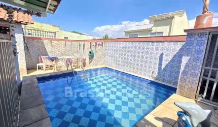 Maravilhosa casa triplex com área gourmet e piscina Moneró