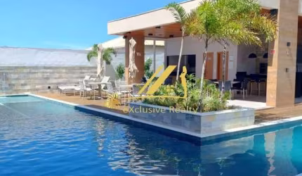 Apartamento 2 suítes com varanda, 64m², cozinha americana, área de serviço. Condomínio Águas de Guarajuba Apart Hotel. 1 vaga de garagem. Perto praia