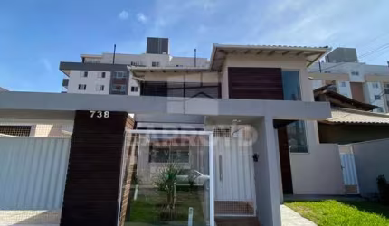 CASA COM SALA COMERCIAL EM ALVENARIA