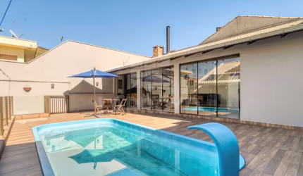 CASA COM EDÍCULA E  PISCINA NO BAIRRO OFICINAS