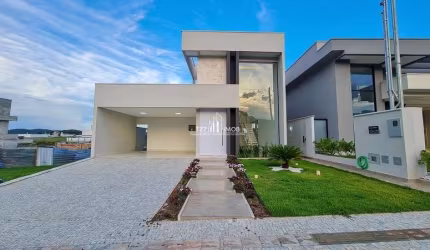 Sobrado com 3 suites plenas no Condomínio Jardim Veneza.