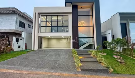 Casa subtérrea com 4 suítes plenas sendo uma master com closet.