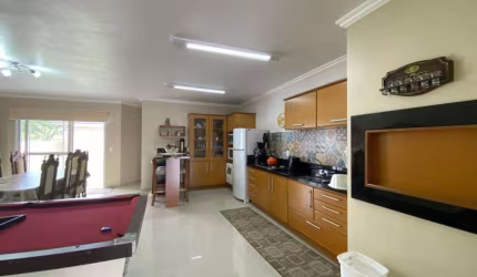 Casa 3 Dormitórios à venda no Bairro CAPÃO NOVO com 130 m² de área privativa - 2 vagas de garagem