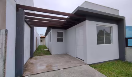 Casa 2 Dormitórios à venda no Bairro VILLAGE - 2 vagas de garagem